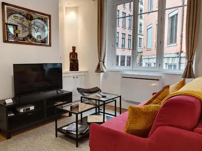 Télévision ou salle de divertissement dans l'établissement Le Tisserand by Cocoonr