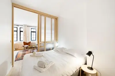 Un ou plusieurs lits dans un hébergement de l'établissement L'Ethnic Ambience - Superbe appartement tout confort au coeur du Vieux Lyon