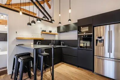 Cuisine ou kitchenette dans l'établissement MOHOM - Berges du Rhône