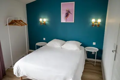 Un ou plusieurs lits dans un hébergement de l'établissement Appartement à Vienne