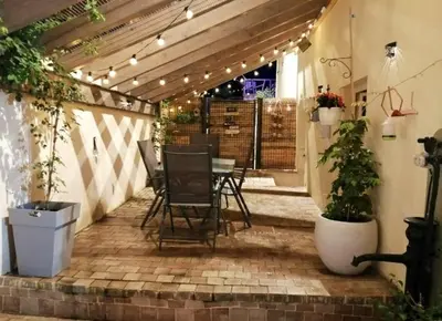 Jardin de l'établissement Appartement cosy au coeur du Beaujolais