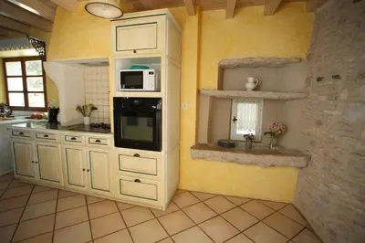 Cuisine ou kitchenette dans l'établissement Siccieu - Au Clair de la Pierre
