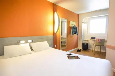 Un ou plusieurs lits dans un hébergement de l'établissement ibis budget Vienne Sud