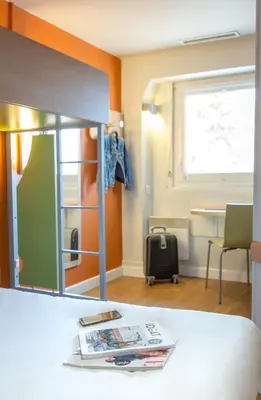 Un ou plusieurs lits dans un hébergement de l'établissement ibis budget Vienne Sud