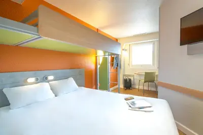 Un ou plusieurs lits dans un hébergement de l'établissement ibis budget Vienne Sud