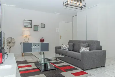 Coin salon dans l'établissement Le Victoria hyper-centre Décines