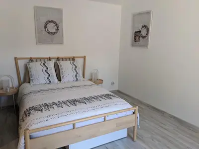 Un ou plusieurs lits dans un hébergement de l'établissement Chambre double indépendante BALI au sein du domaine PASSELOUP