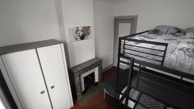 Un ou plusieurs lits dans un hébergement de l'établissement Appart - Hotel La Batisse de Saint-Chamond