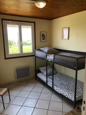 Un ou plusieurs lits dans un hébergement de l'établissement Le Petit Gîte de Javernières Etage