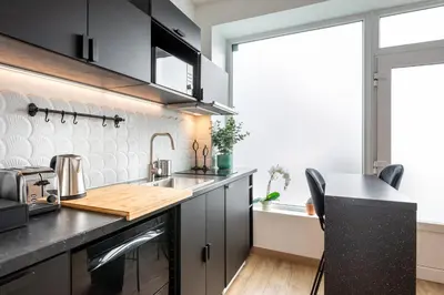 Cuisine ou kitchenette dans l'établissement Le Cocon Des Artistes