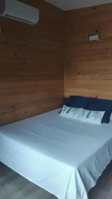Un ou plusieurs lits dans un hébergement de l'établissement Lodge climatisé avec vue panoramique