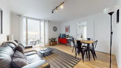 Coin salon dans l'établissement Appartement PLEIN-CIEL