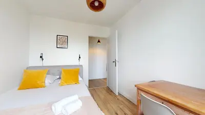 Un ou plusieurs lits dans un hébergement de l'établissement Appartement PLEIN-CIEL