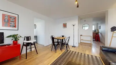 Coin salon dans l'établissement Appartement PLEIN-CIEL