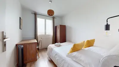 Un ou plusieurs lits dans un hébergement de l'établissement Appartement PLEIN-CIEL