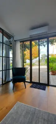 Coin salon dans l'établissement La Parenthèse, Rez de jardin indépendant, 4 étoiles
