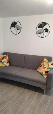 Coin salon dans l'établissement Bald'Home