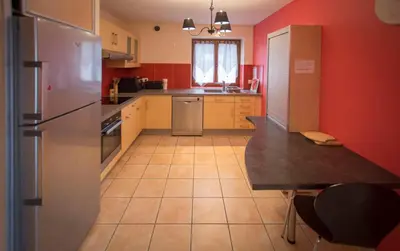 Cuisine ou kitchenette dans l'établissement AU DOMAINE DE CHASSE