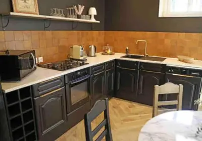 Cuisine ou kitchenette dans l'établissement Maison d'hôtes La Bella Casa