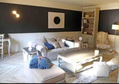 Coin salon dans l'établissement Maison d'hôtes La Bella Casa
