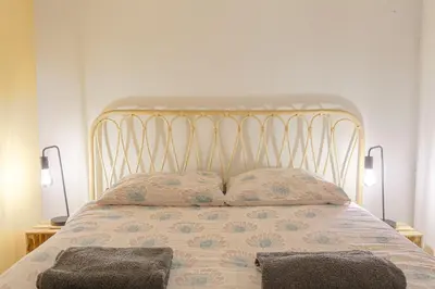 Un ou plusieurs lits dans un hébergement de l'établissement Duplex, bohème et fonctionnel proche Gratte-Ciel