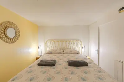 Un ou plusieurs lits dans un hébergement de l'établissement Duplex, bohème et fonctionnel proche Gratte-Ciel