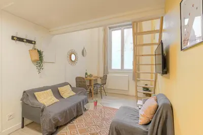 Coin salon dans l'établissement Duplex, bohème et fonctionnel proche Gratte-Ciel