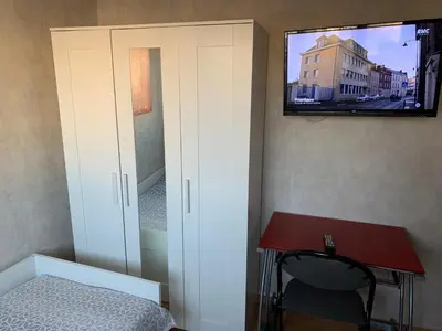 Télévision ou salle de divertissement dans l'établissement Jolie chambre Nenuphar dans belle maison
