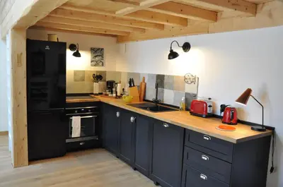 Cuisine ou kitchenette dans l'établissement VILLA VILLOU