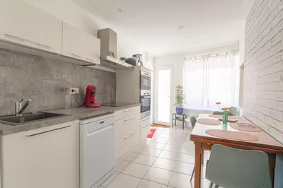 Cuisine ou kitchenette dans l'établissement Le Triplex, 2 chambres, 2 salles de bain