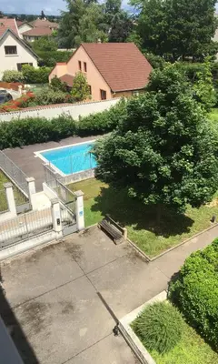 Piscine de l'établissement Appartement tout équipé avec piscine proche Stade OL et EUREXPO ou située à proximité