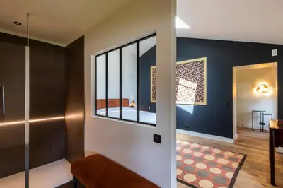 Un ou plusieurs lits dans un hébergement de l'établissement Hôtel Villa Alexandre