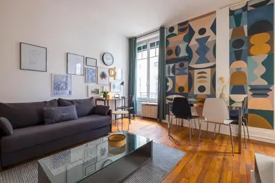 Coin salon dans l'établissement HONORÊ SUITE BOISSAC