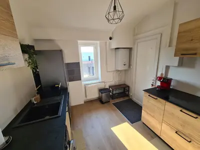 Cuisine ou kitchenette dans l'établissement L'industriel, spacieux T2 refait à neuf