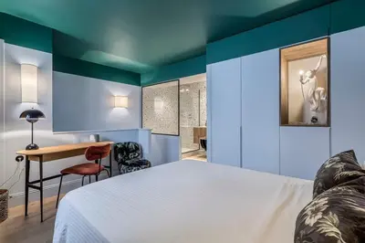 Un ou plusieurs lits dans un hébergement de l'établissement Jungle-Art - Furnished apartment - Downtown Lyon