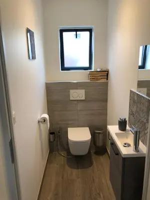 Salle de bains dans l'établissement La Croisée Chambre d hôte avec sanitaires partagés