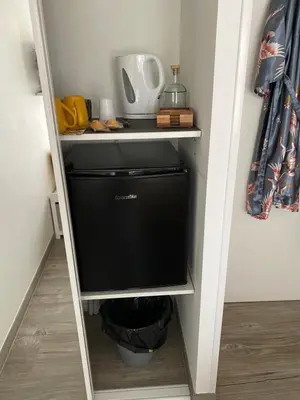 Cuisine ou kitchenette dans l'établissement La Croisée Chambre d hôte avec sanitaires partagés