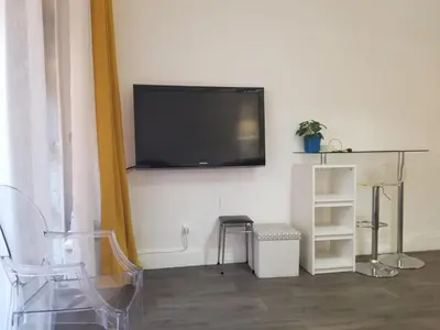 Télévision ou salle de divertissement dans l'établissement La Traboule Vieux Lyon