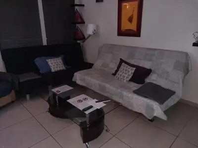 Coin salon dans l'établissement appartement 2 chambres fonctionnel a faire 2 pas du metro