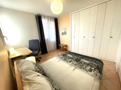 Un ou plusieurs lits dans un hébergement de l'établissement Chambre Privée en colocation dans un appartement Vaulx en Velin Centre