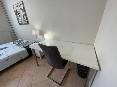 Un ou plusieurs lits dans un hébergement de l'établissement Chambre Privée en colocation dans un appartement Vaulx en Velin Centre