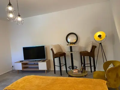 Télévision ou salle de divertissement dans l'établissement Le BARABAN