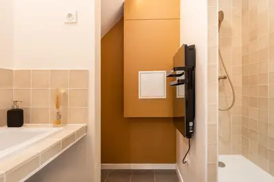 Salle de bains dans l'établissement Les Cocon des Pentes de la Soie