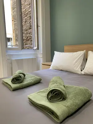 Un ou plusieurs lits dans un hébergement de l'établissement Appartement de Standing pour 6 refait à neuf