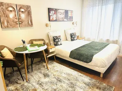 Un ou plusieurs lits dans un hébergement de l'établissement Studio ZEN cosy gare part dieu