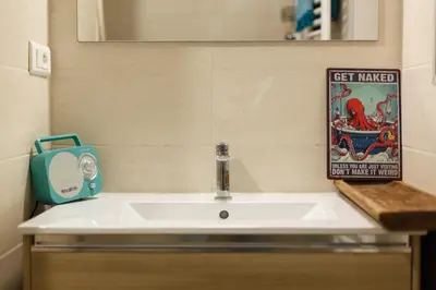 Salle de bains dans l'établissement Les Magnolias