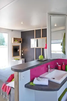 Cuisine ou kitchenette dans l'établissement Kanopée Village