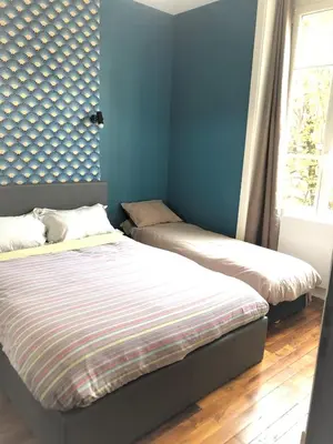 Un ou plusieurs lits dans un hébergement de l'établissement Côté Cour Lyon Part Dieu