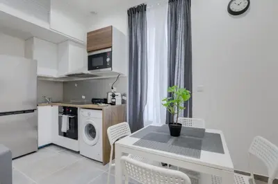 Cuisine ou kitchenette dans l'établissement GuestReady - 1chambre, 5min Gare Part Dieu
