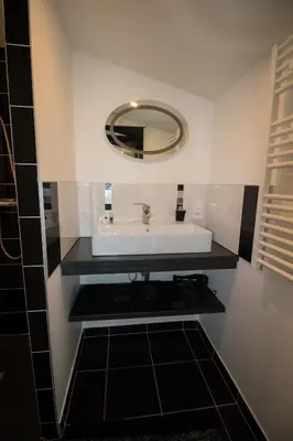 Salle de bains dans l'établissement Chambres d hôtes au Domaine de Robert